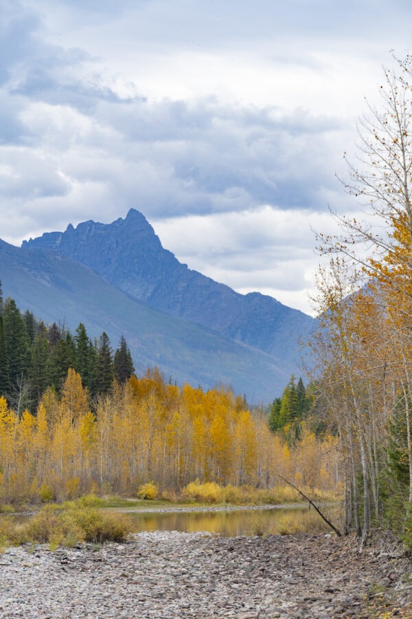 A lake with colorful trees surroundings