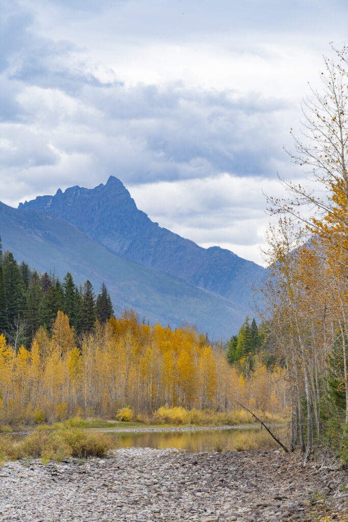 A lake with colorful trees surroundings