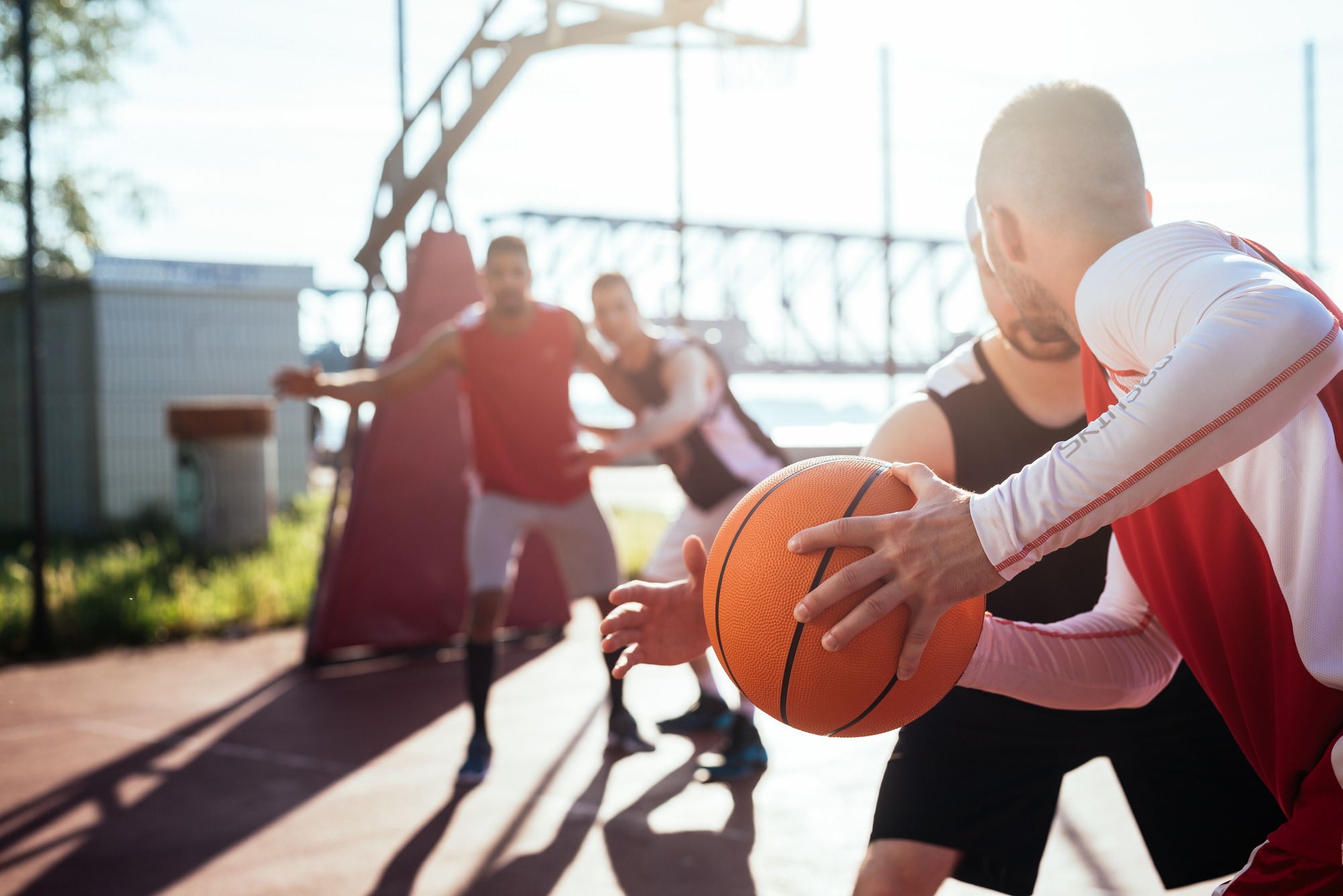 Man passing the ball to another player